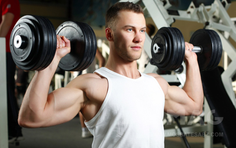 پرس سرشانه دمبل ایستاده